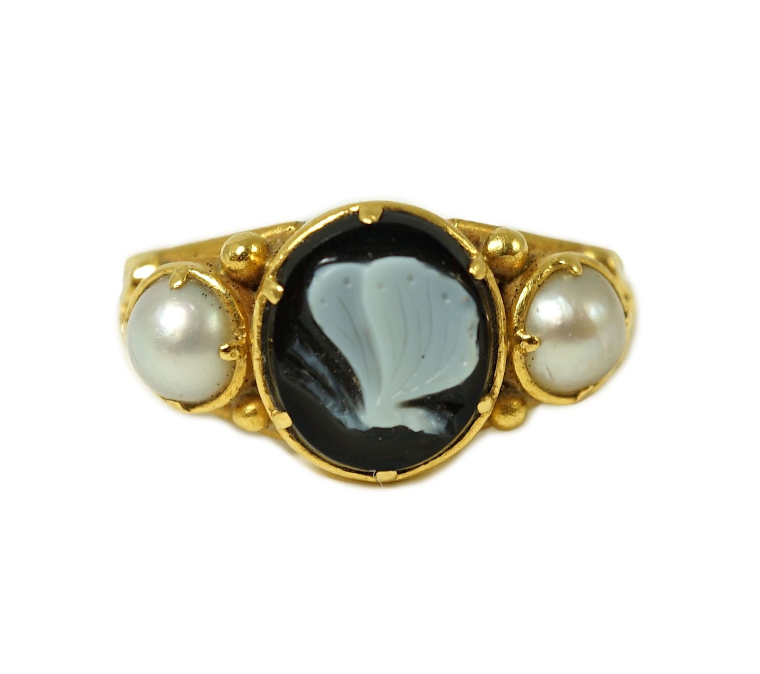 A William IV gold, split pearl and sardonyx set mourning ring